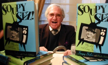 Soupy Sales signs his book at the Friars Club in 2001