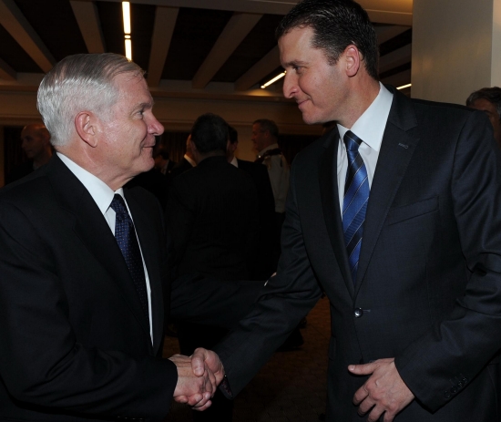 Defense Secretary Robert Gates (left) is greeted by Dan Tel Aviv general manager Etai Eliaz as he arrives for a formal dinner with Israel Defense Minister Ehud Barak. The IDF chief of staff, the head of Israel’s military intelligence and the U.S. ambassador joined them in the newly renovated hotel restaurant.