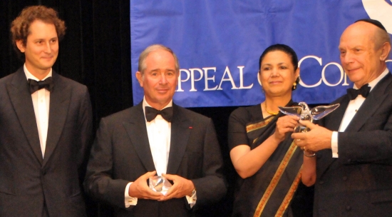 John Elkann, Stephen Schwarzman, and Ambassador Meera Shankar receive awards from Rabbi Arthur Schneier