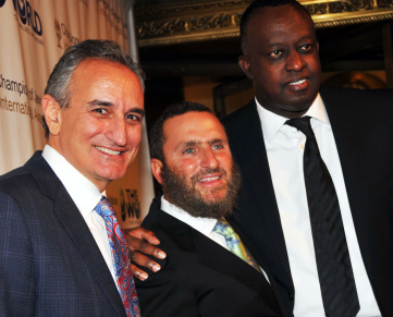David Sterling, dinner committee chair, with Rabbi Shmuley Boteach and Rwanda Ambassador Eugene Gasana