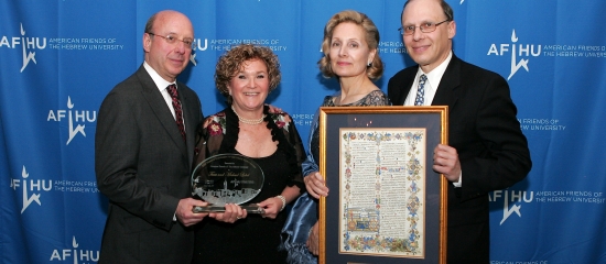Tina and Michael Lobell, left, with the Scopus Award, 