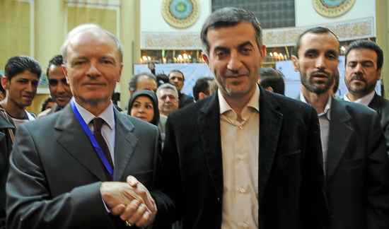 Esfandiar Rahim Mashaei (right), vice president of Iran and president of Iran Cultural Heritage, Handicrafts and Tourism Organization (ICHTO), welcomes Herve Barre, head of the Sustainable Tourism Programme at the World Heritage Centre of UNESCO, to the First International Tour Operators Convention in Tehran. 
