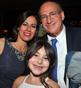Sharri Berg, husband Barry Levine and daughter August, 8