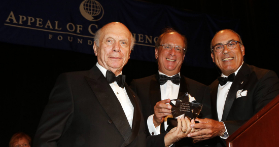 Rabbi Arthur Schneier, Laurence D. Fink and Muhtar Kent, chairman and CEO of the Coca-Cola Company