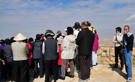 Japanese praying on Mount Nebo