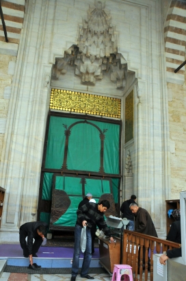 Take your shoes off at the entrance of the mosque