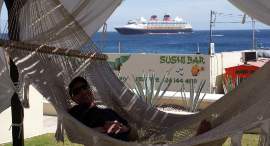 Gideon Davis in hammock at CasaDorada hotel, overlooking the harbor in Cabo St. Lucas
